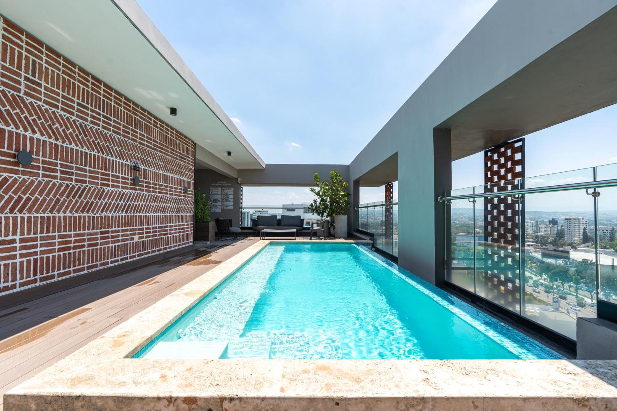 Modern Luxury Condo With Rooftop Pool & Gym サンティアゴ・デ・ロス・カバリェロス エクステリア 写真